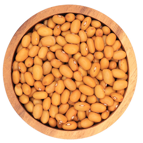 Bruine bonen in houten kom – glanzende lichtbruine bonen met ovale vorm