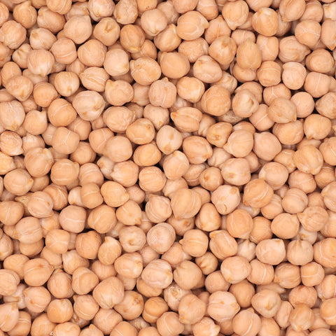 Close-up van kikkererwten – beige ronde erwten met licht gerimpelde schil