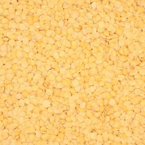 Close-up van gele linzen – kleine ronde linzen met matte gele kleur