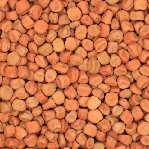 Close-up van kapucijners – ronde bruingroene erwten met matte schil